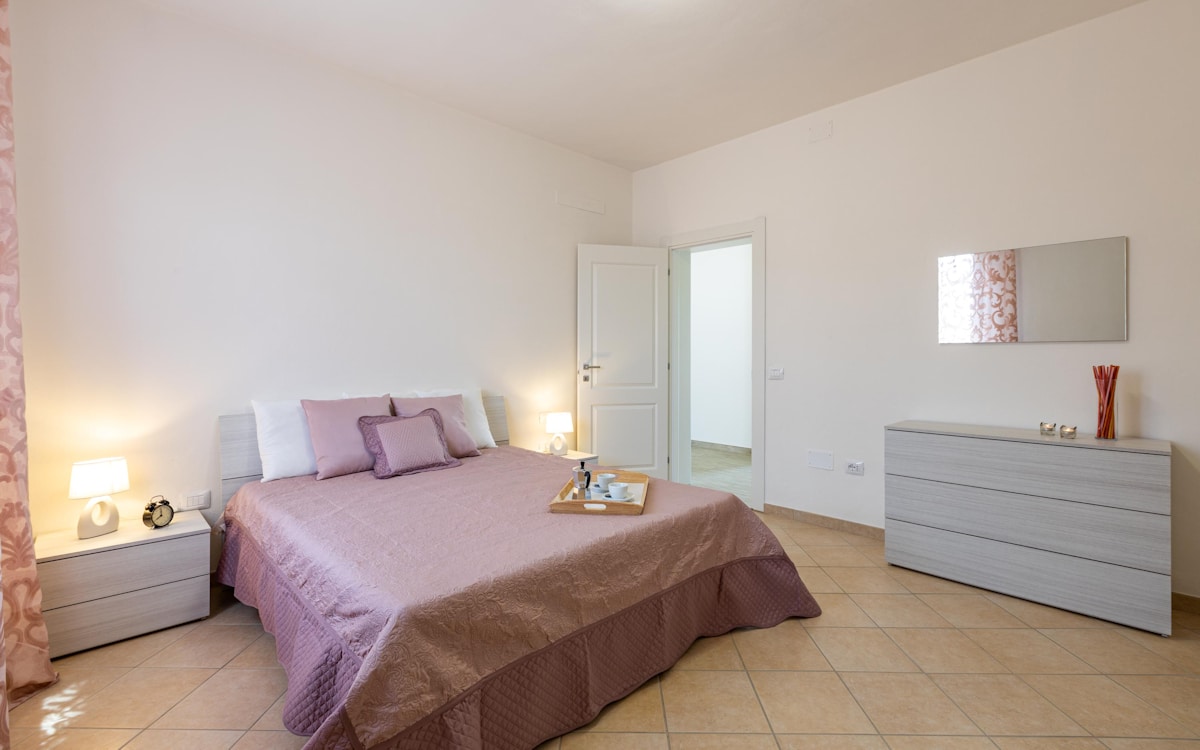 Ferienwohnung Selvatelle Schlafzimmer 1 (1) Ferienwohnung Selvatelle Schlafzimmer 1 (1)