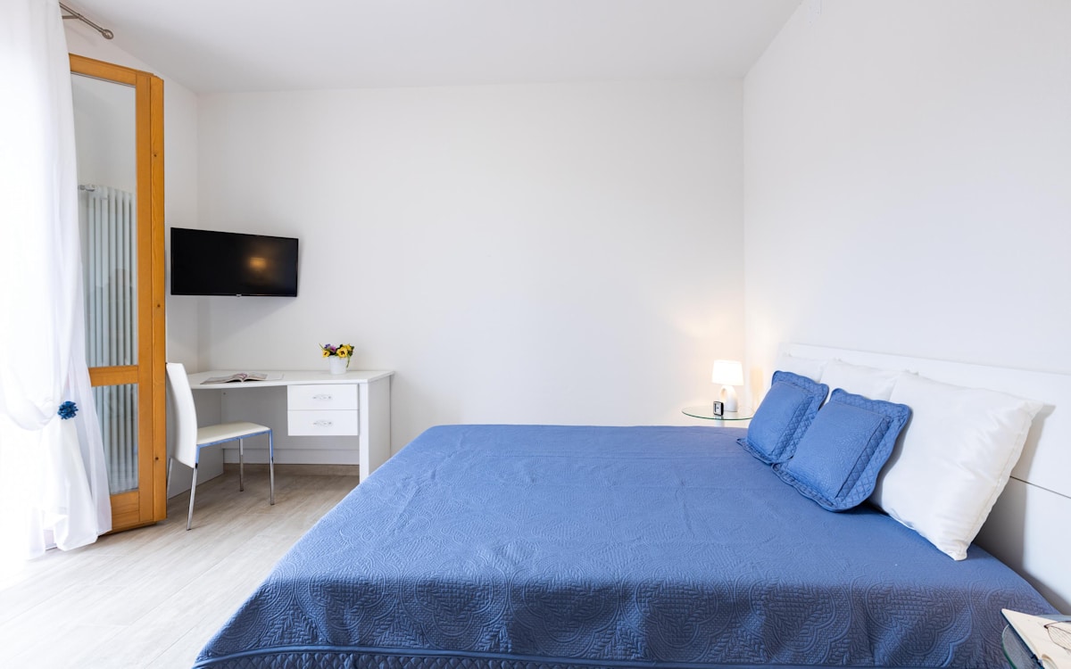 Ferienwohnung Selvatelle Schlafzimmer 2 (3) Ferienwohnung Selvatelle Schlafzimmer 2 (3)