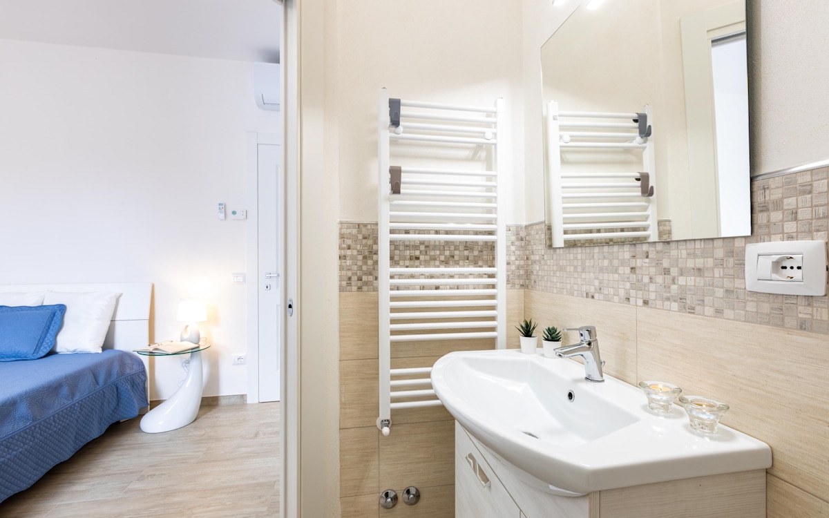 Ferienwohnung Selvatelle Schlafzimmer 2 mit Badezimmer (1) Ferienwohnung Selvatelle Schlafzimmer 2 mit Badezimmer (1)