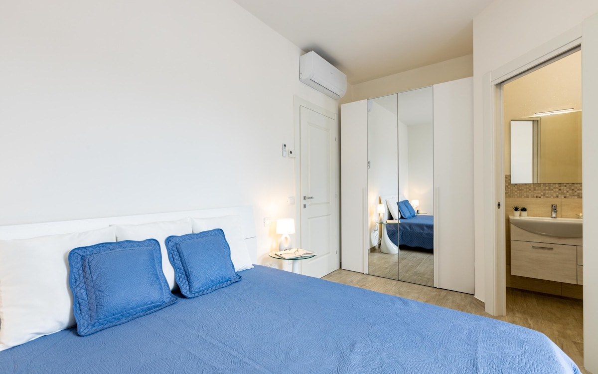 Ferienwohnung Selvatelle Schlafzimmer 2 mit Badezimmer (2) Ferienwohnung Selvatelle Schlafzimmer 2 mit Badezimmer (2)